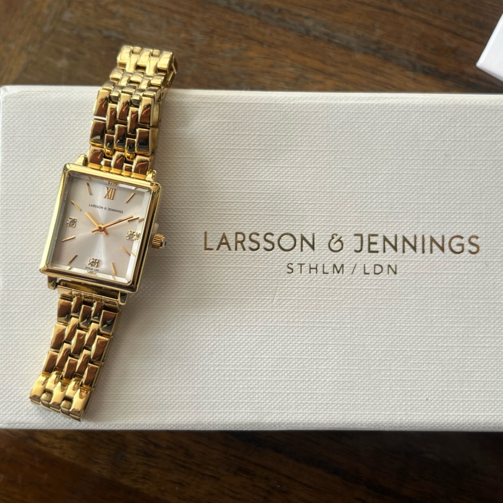 Larson and Jennings Gold White 31MM Watch